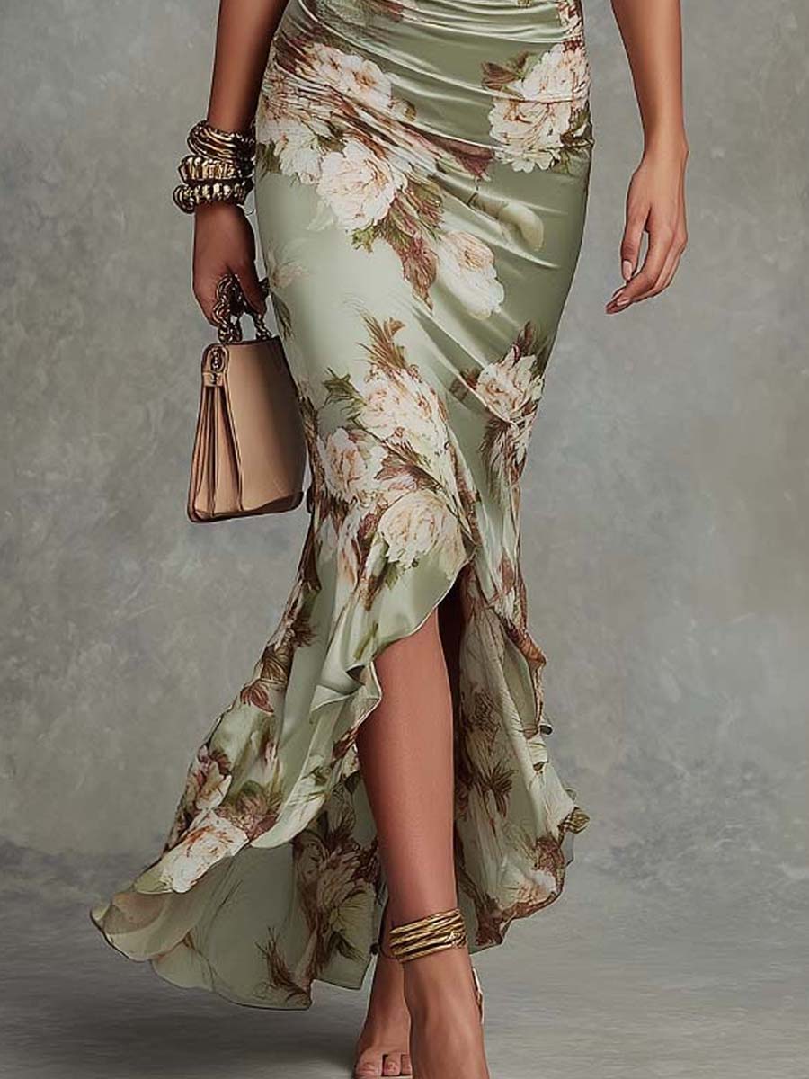 Isabella - Asymmetrical long dress in green satin with V-neck, flared puff sleeves, and floral pattern