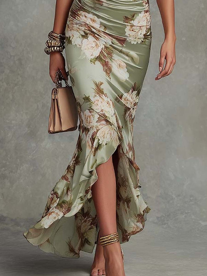 Isabella - Asymmetrical long dress in green satin with V-neck, flared puff sleeves, and floral pattern
