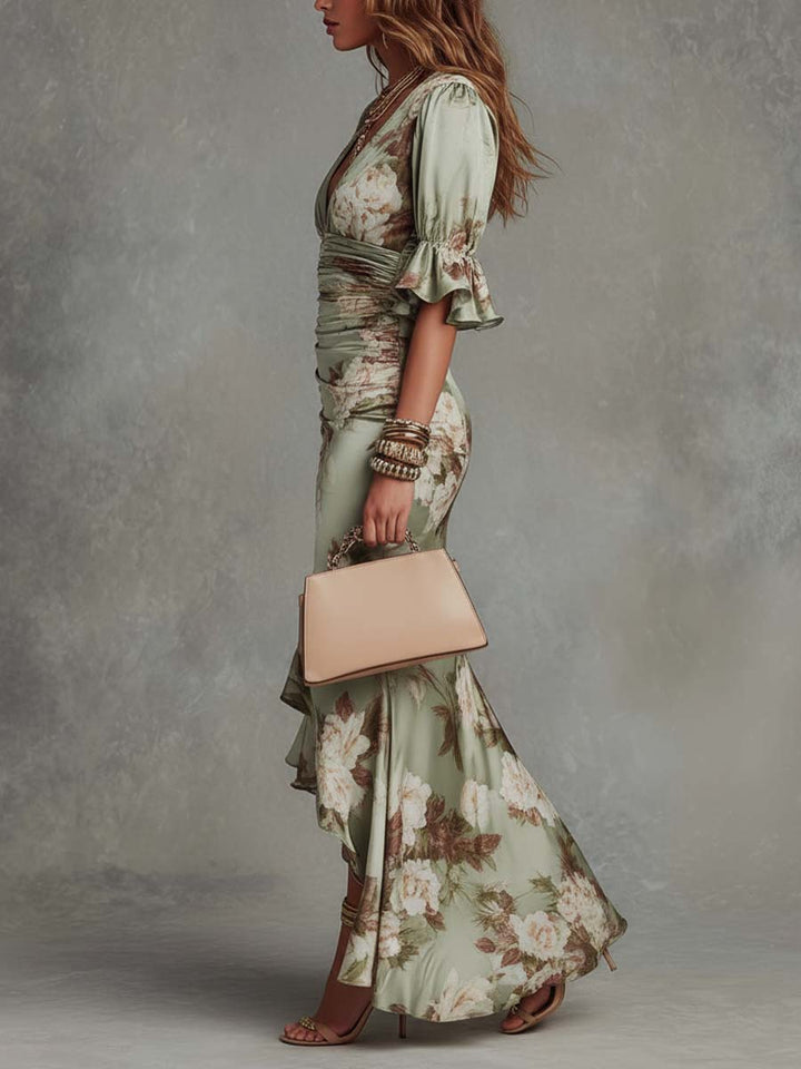 Isabella - Asymmetrical long dress in green satin with V-neck, flared puff sleeves, and floral pattern